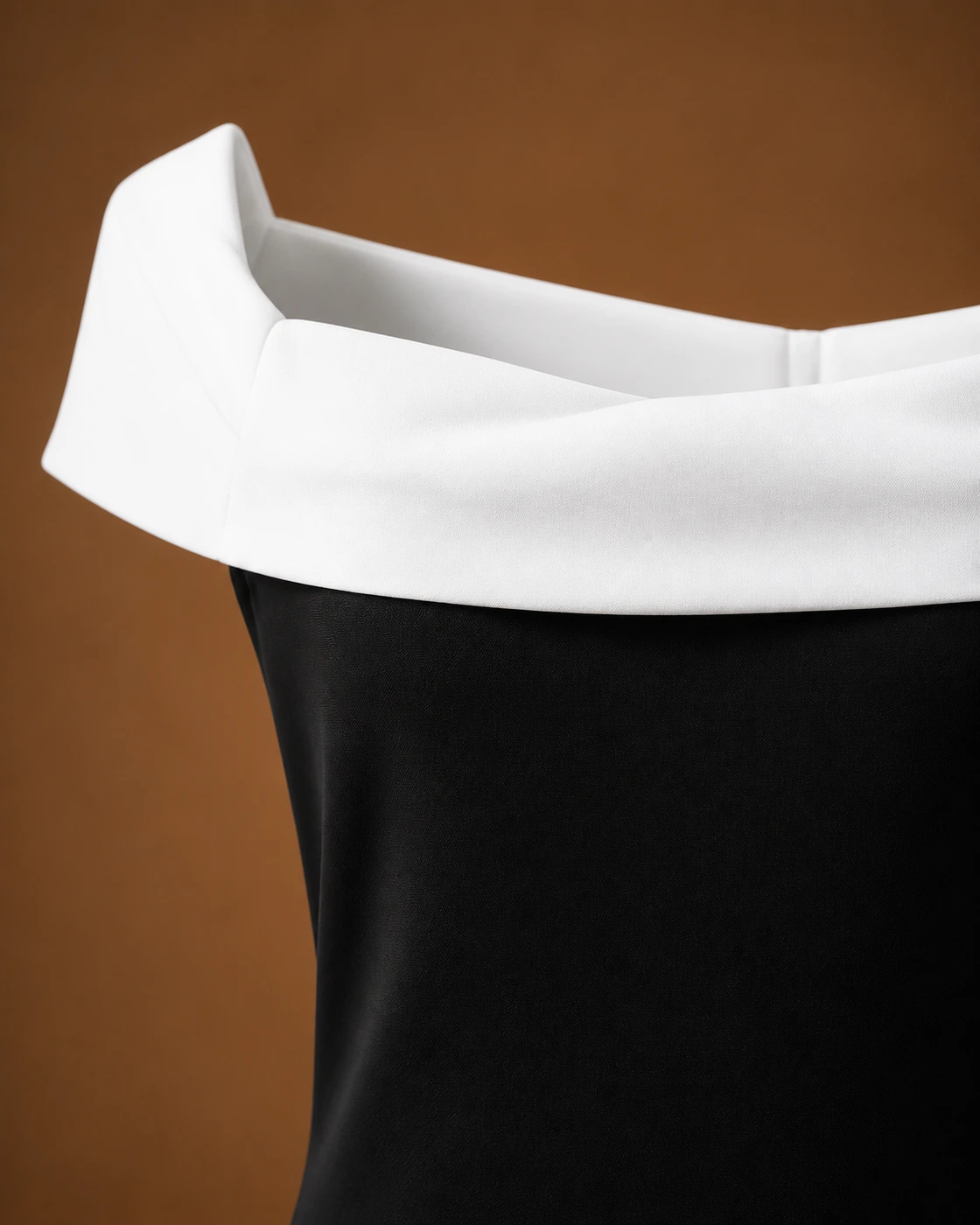 Ivory Folded-Neck Black Dress · fabric detail.