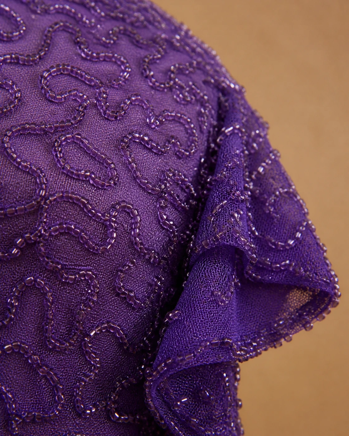 Violet Beaded Mini Dress · fabric detail.