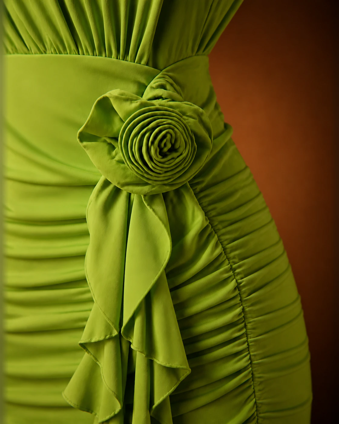Lime One-Shoulder Rosette Ruched Mini Dress · fabric detail.