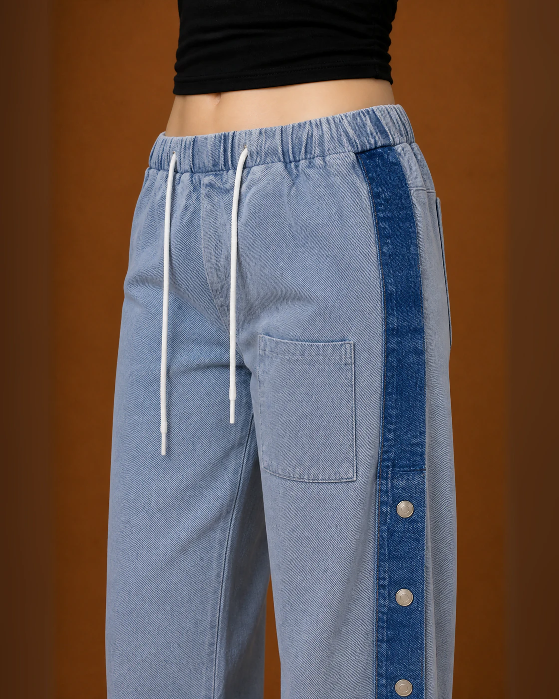 Black Cropped Tee and Light-Wash Snap-Panel Trousers Set · fabric detail.